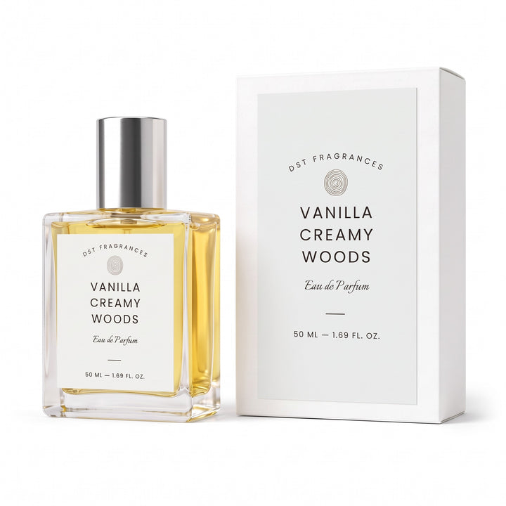A 50 ml bottle of DST Fragrances Vanilla Creamy Woods Eau de Parfum with a silver cap, shown next to its white packaging box on a clean white background.