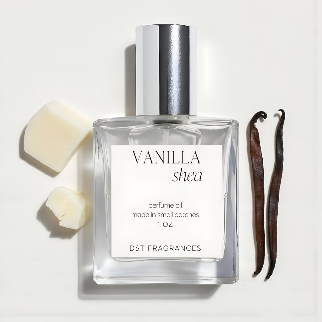 Vanilla Shea perfume oil bottle with vanilla beans and shea butter on a light background