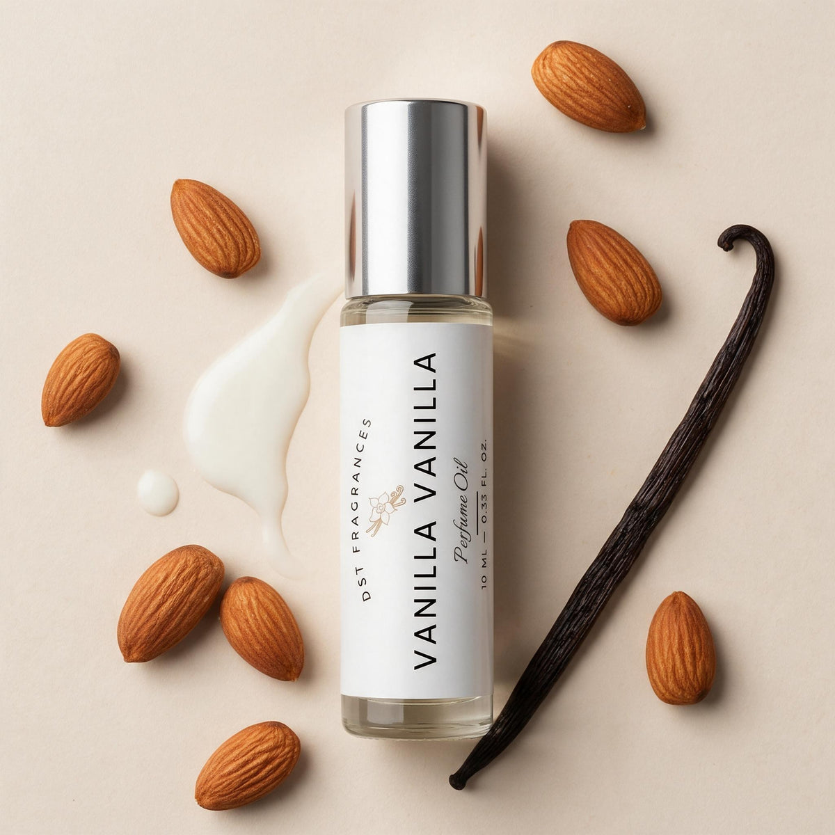 A bottle of Vanilla Vanilla perfume oil by Dst Fragrances, styled with whole almonds, a vanilla bean, and a cream-colored almond paste on a light beige background.