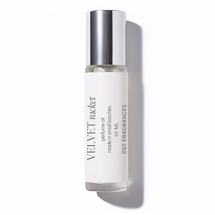Velvet Racket Perfume oil bottle with silver cap on a white background