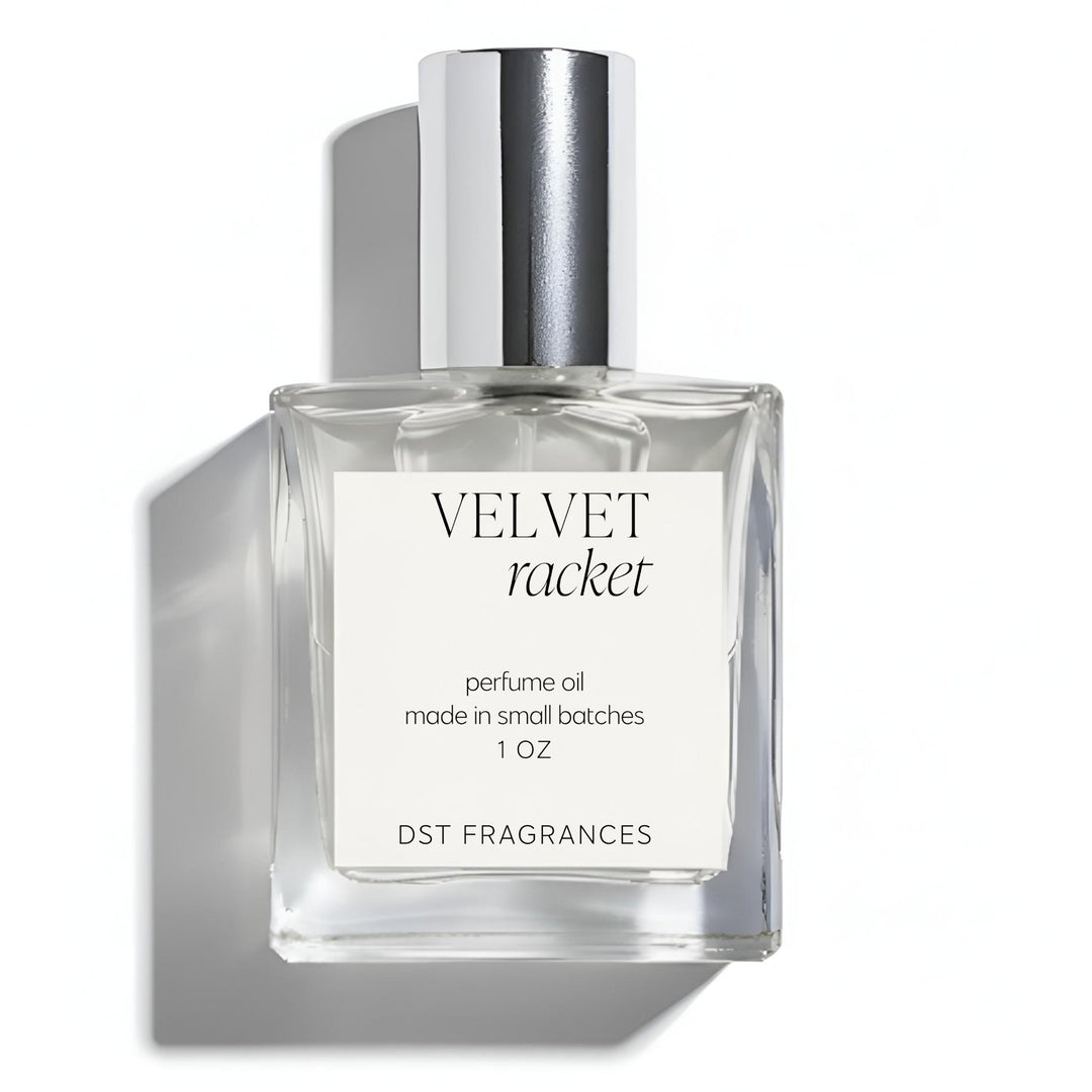 Perfume oil bottle labeled 'Velvet Racket' on a white background