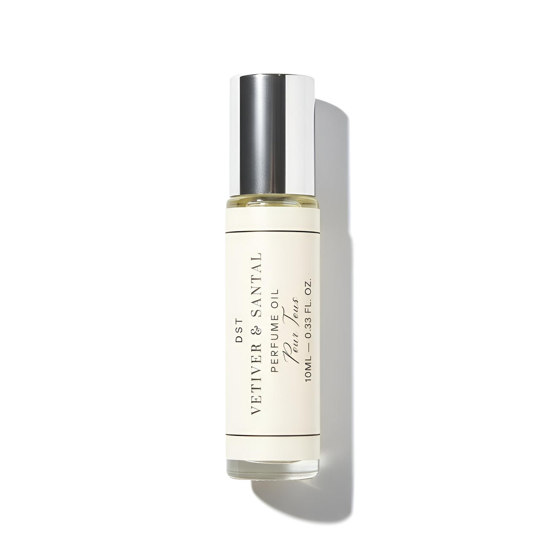 Vetiver Santal Perfume oil bottle with a white background