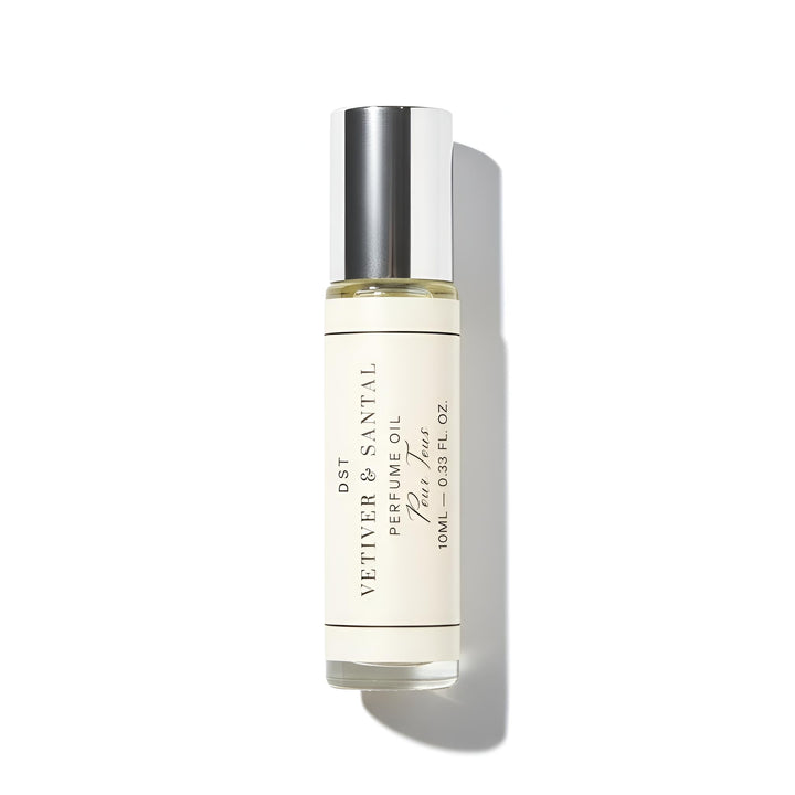 Vetiver Santal Perfume oil bottle with a white background