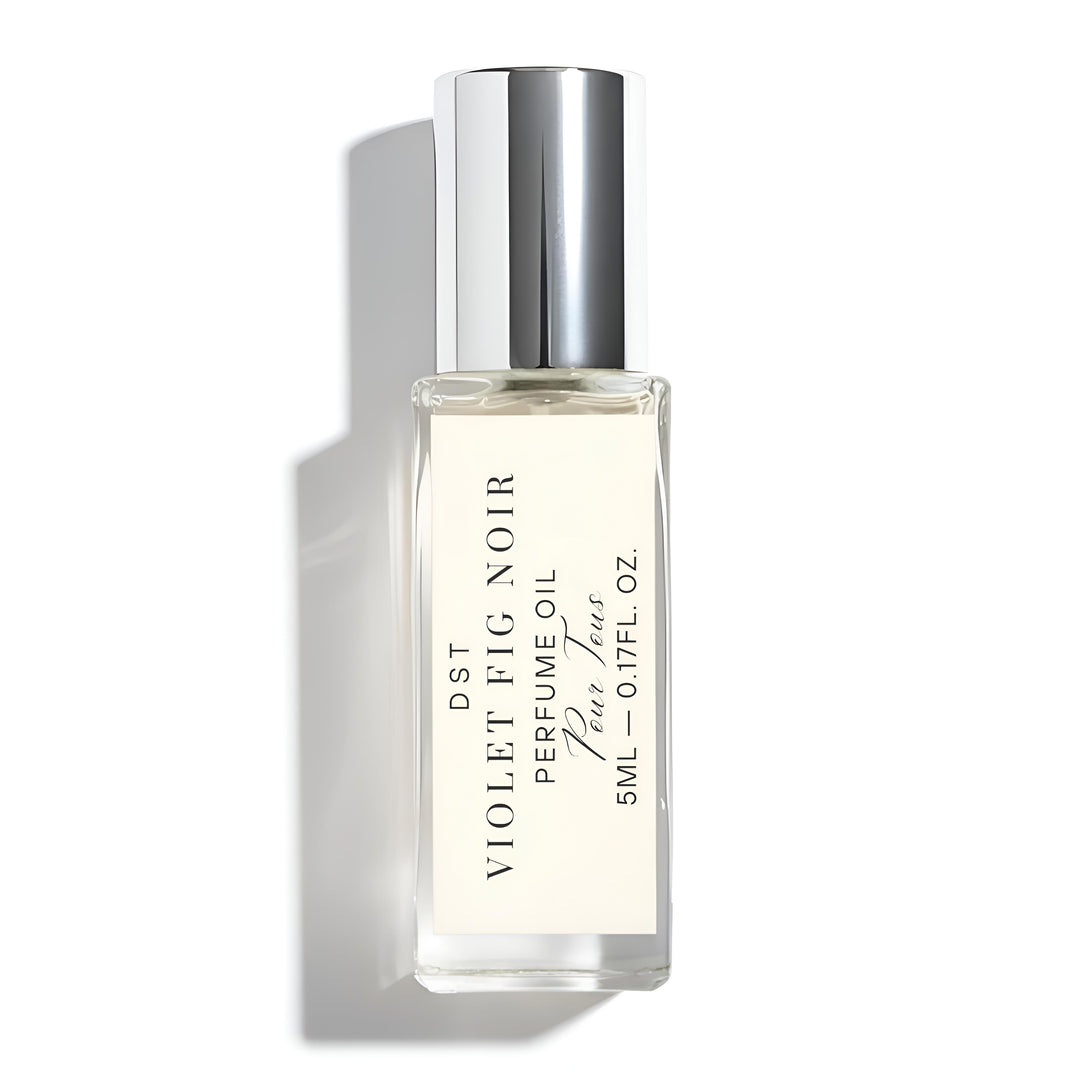 Perfume oil bottle labeled 'Violet Fig Noir' on a white background