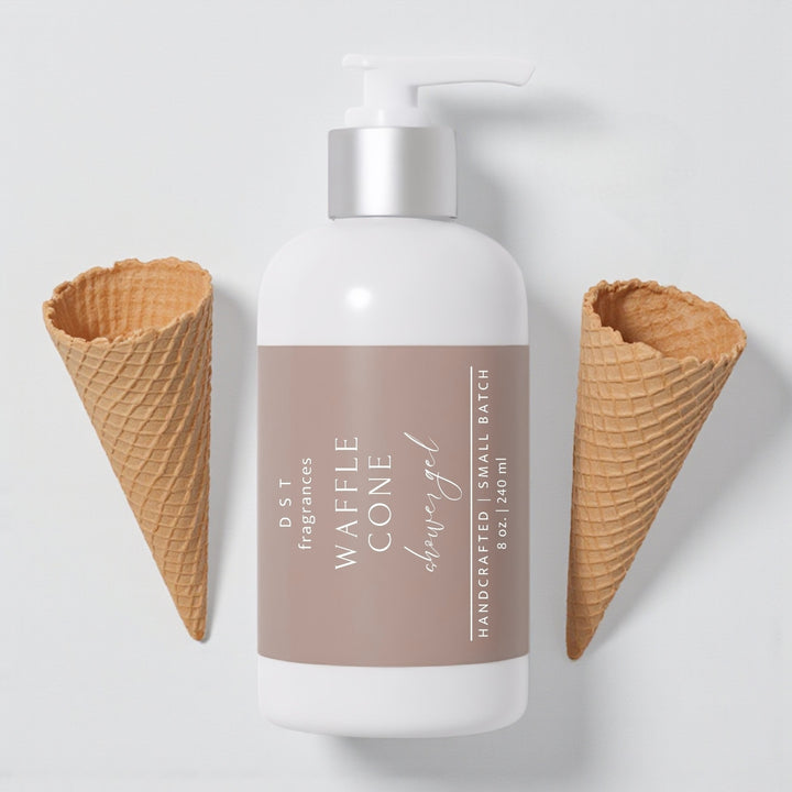 240ml bottle of Waffle Cone scented shower gel by DST Fragrances against a white background with 2 empty waffle cones.