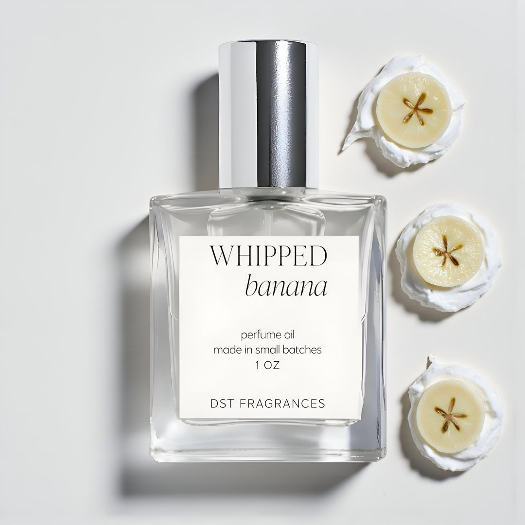 Perfume oil bottle labeled 'Whipped Banana' with banana slices on a white background