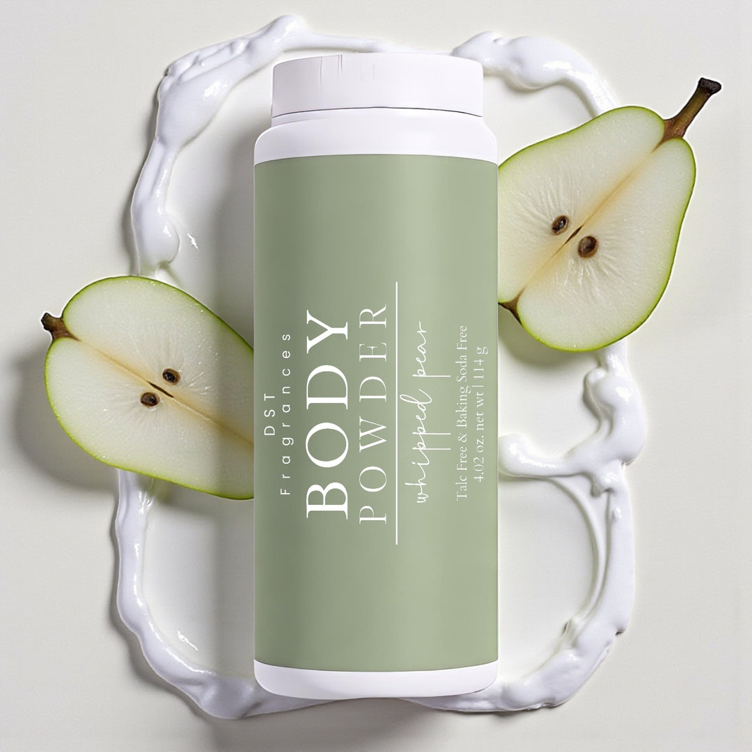 114g bottle of Whipped Pear scented Body Powder by DST Fragrances against a white background with pears and dollops of white whipped cream.