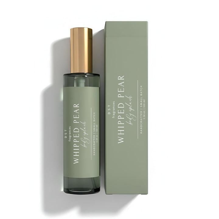 100ml bottle of Whipped Pear scented Body Splash and its box by DST Fragrances against a white background.