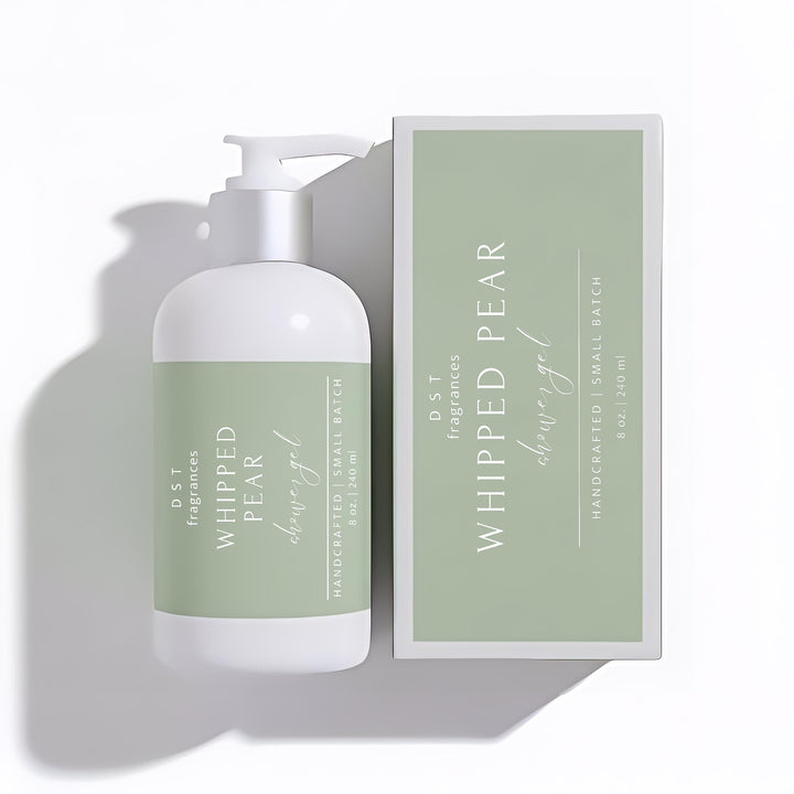 8oz bottle of Whipped Pear scented Shower Gel and its box by DST Fragrances against a white background.