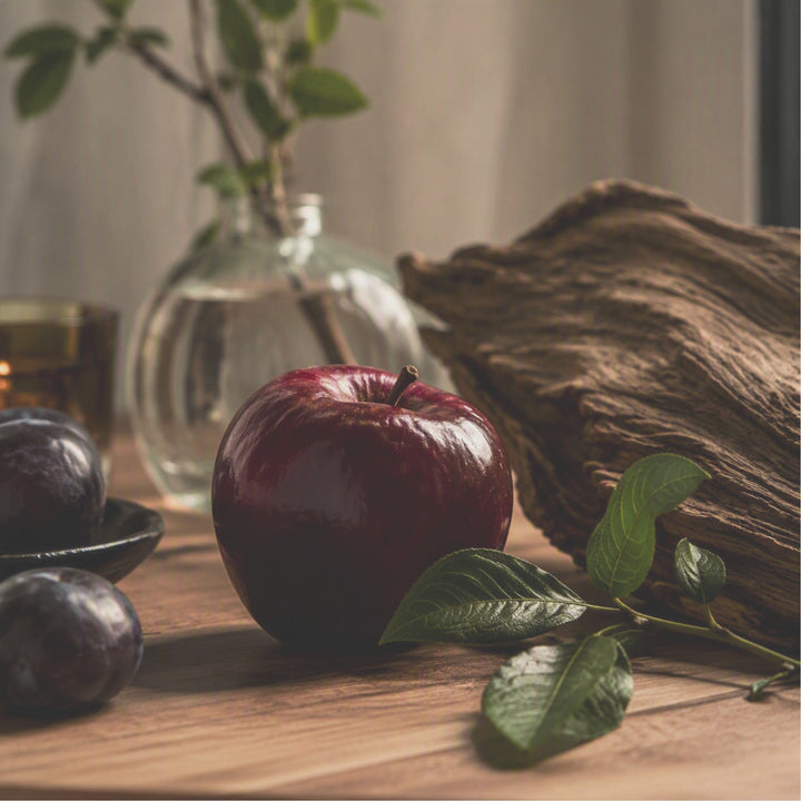 A cool, understated apple opens the scent—smooth, polished, and quietly dark. A touch of plum adds depth before the fragrance settles into warm amber, dry cedarwood, and earthy patchouli. Sophisticated and shadowy, Apple Noir is a modern fruit‑and‑woods blend with a distinctly refined edge.